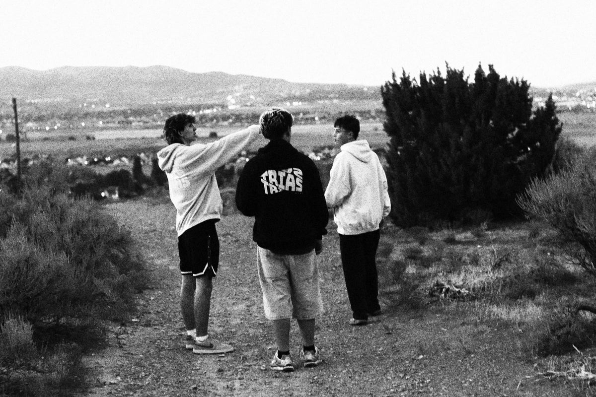 Braxton, Daxton, and Easton together outdoors